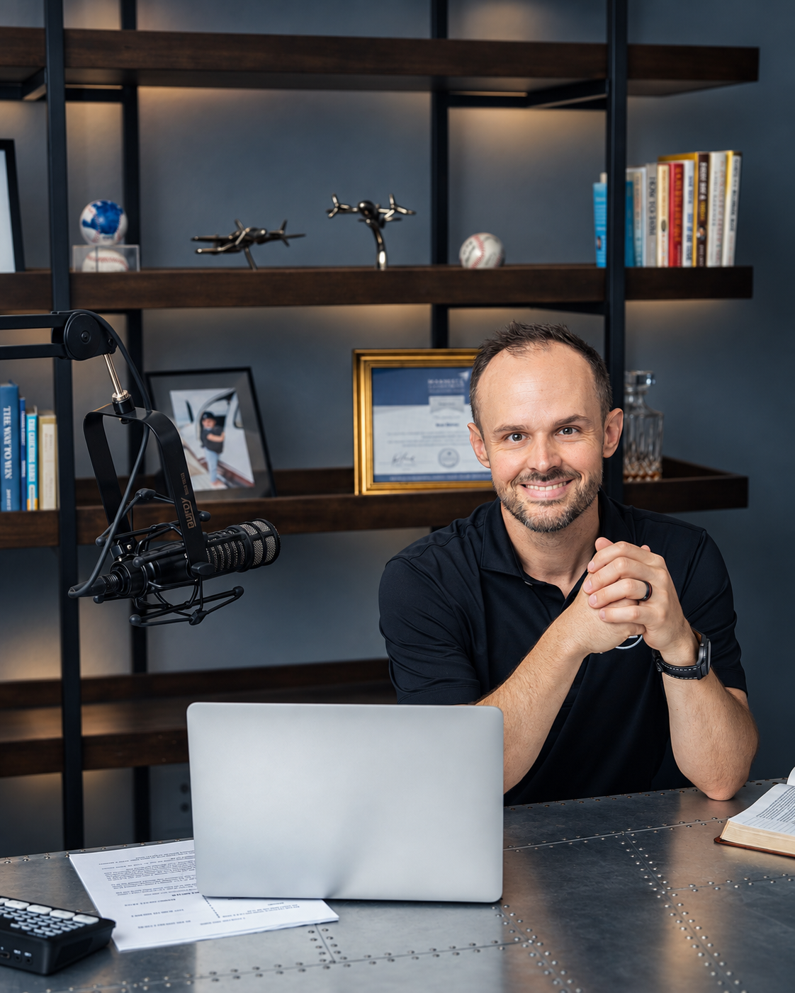 A Limitless Leadership coach at his desk in the studio